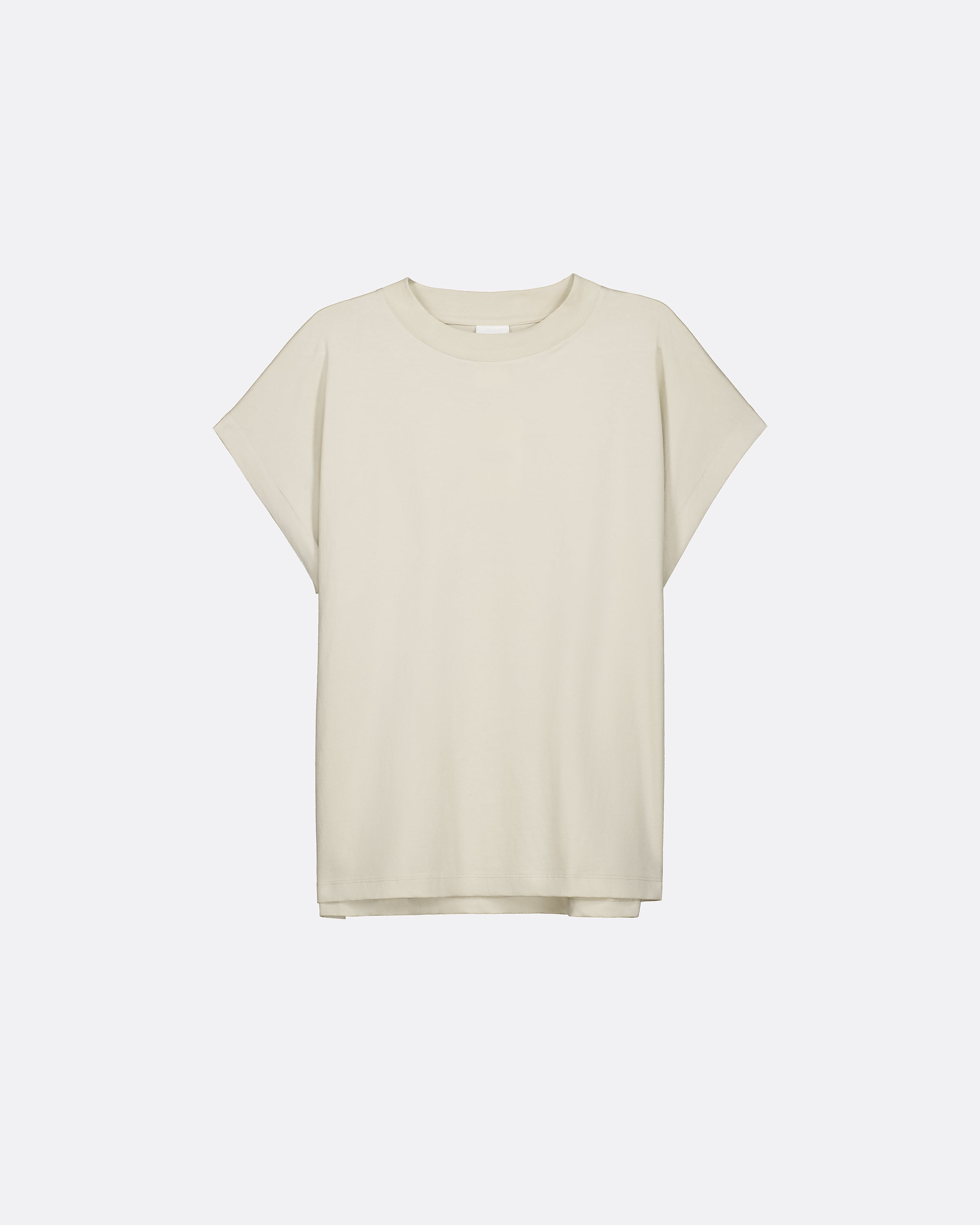 A light beige short-sleeve crewneck t-shirt with a relaxed, oversized fit, displayed against a clean, light gray background.