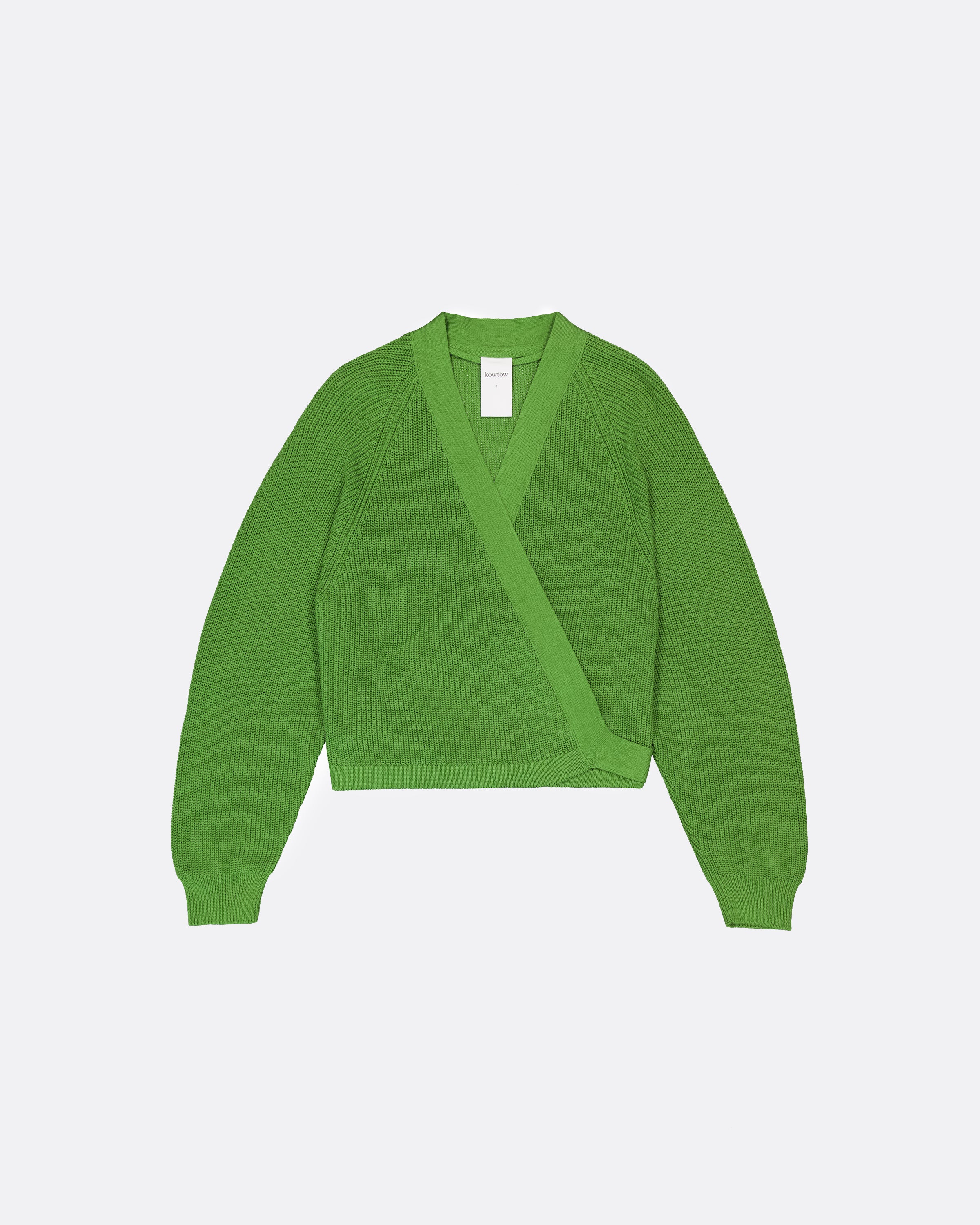 A bright green knit wrap cardigan sweater with long sleeves and a crossover front, displayed flat against a light gray background.
